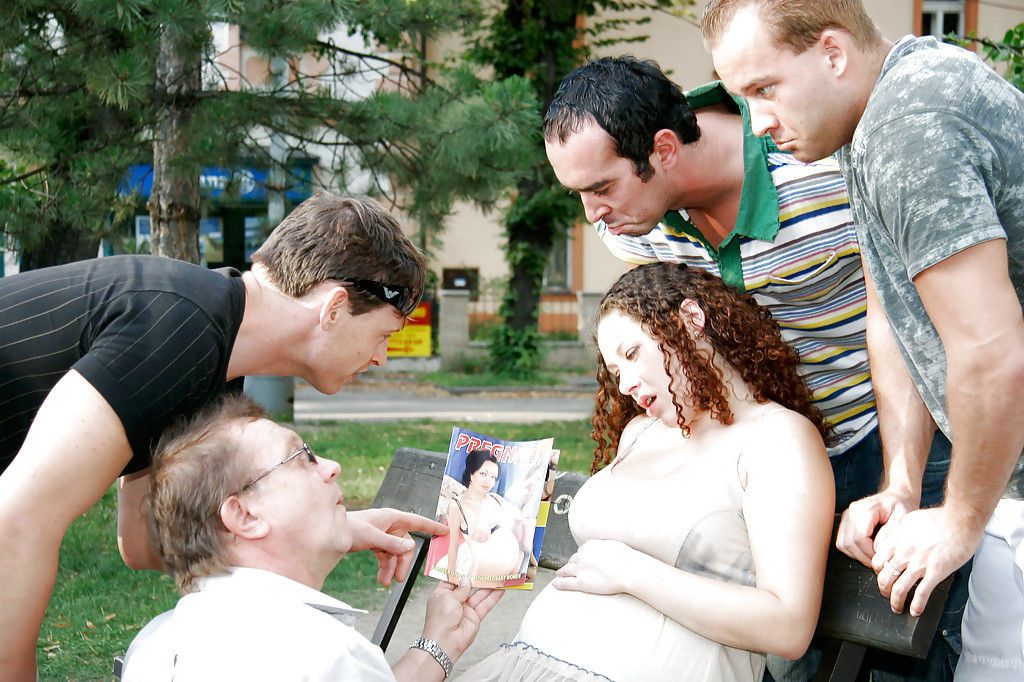 Curly-haired pregnant slut gets banged by four horny lads outdoor