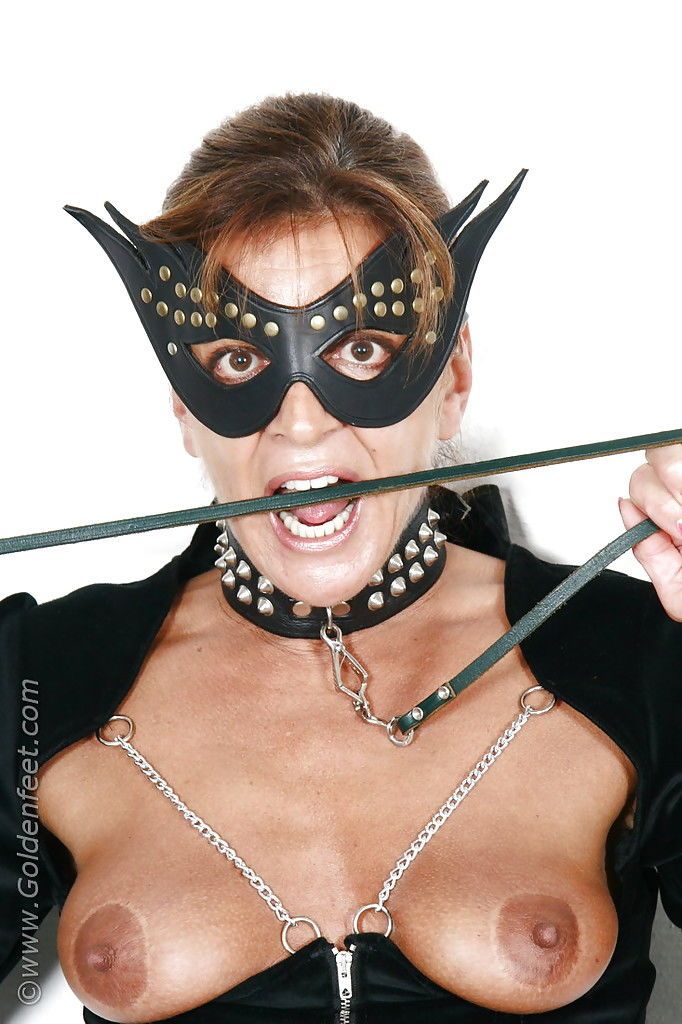Kinky mature UK BDSM model Lady Sarah flashing pierced upskirt pussy