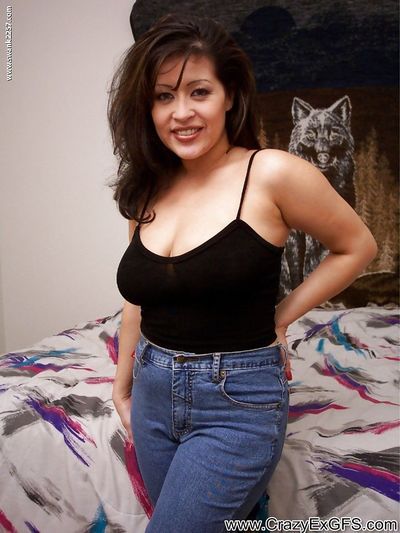 Sassy latina MILF with massive jugs undressing and teasing her slit