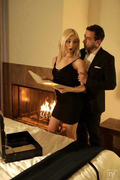 Thin blonde Chloe Temple goes pussy to mouth in front of a fireplace